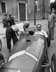 Benedicto Campos (leaning over) and Juan Emmanuel Fangio