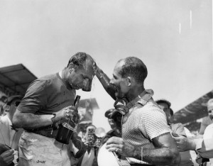 Juan Manuel Fangio of Argentina gets doused with water after losing the 25th Grand Prix of Pescara